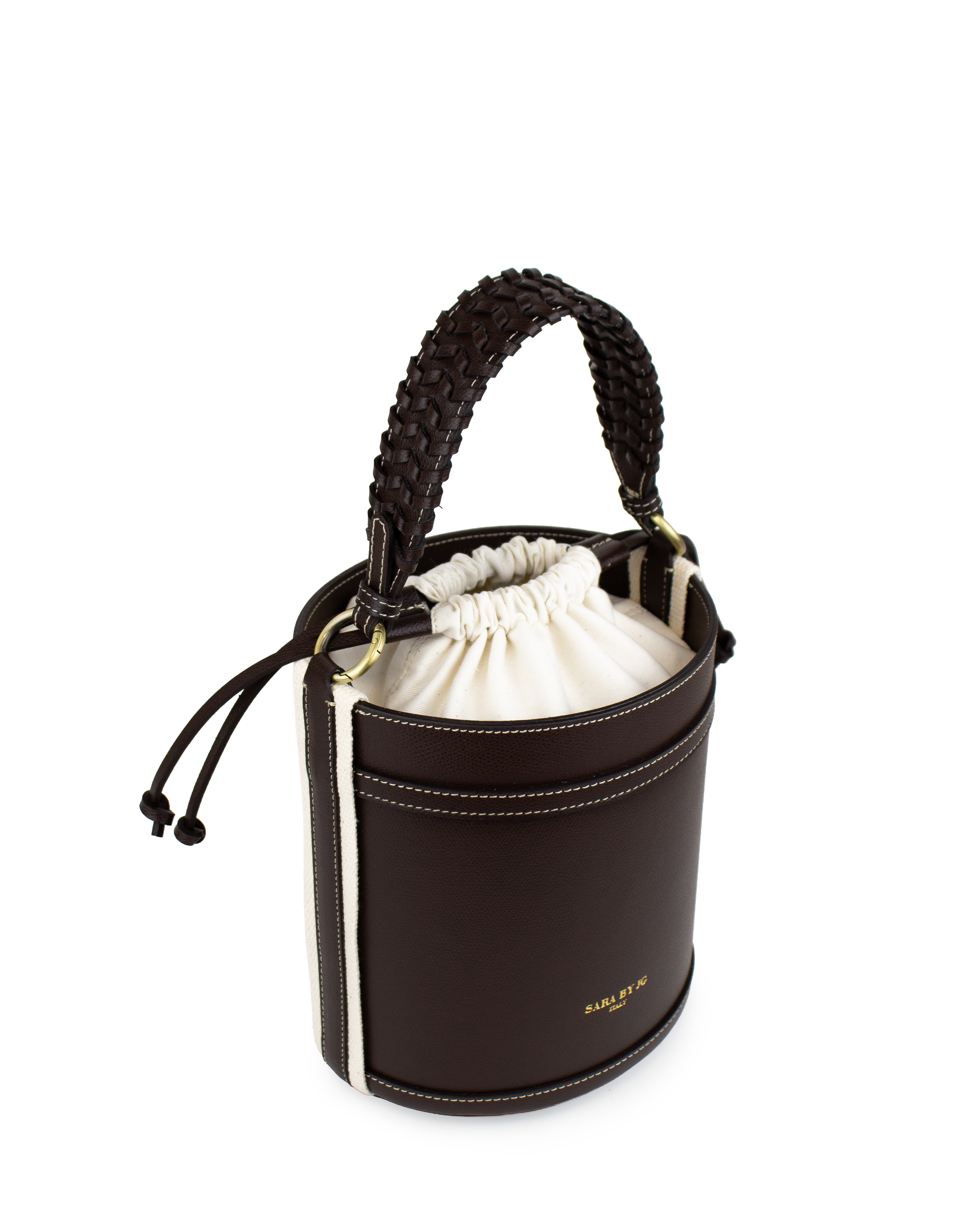 Modern minimalist bucket bag in brown leather with braided handle and drawstring closure.