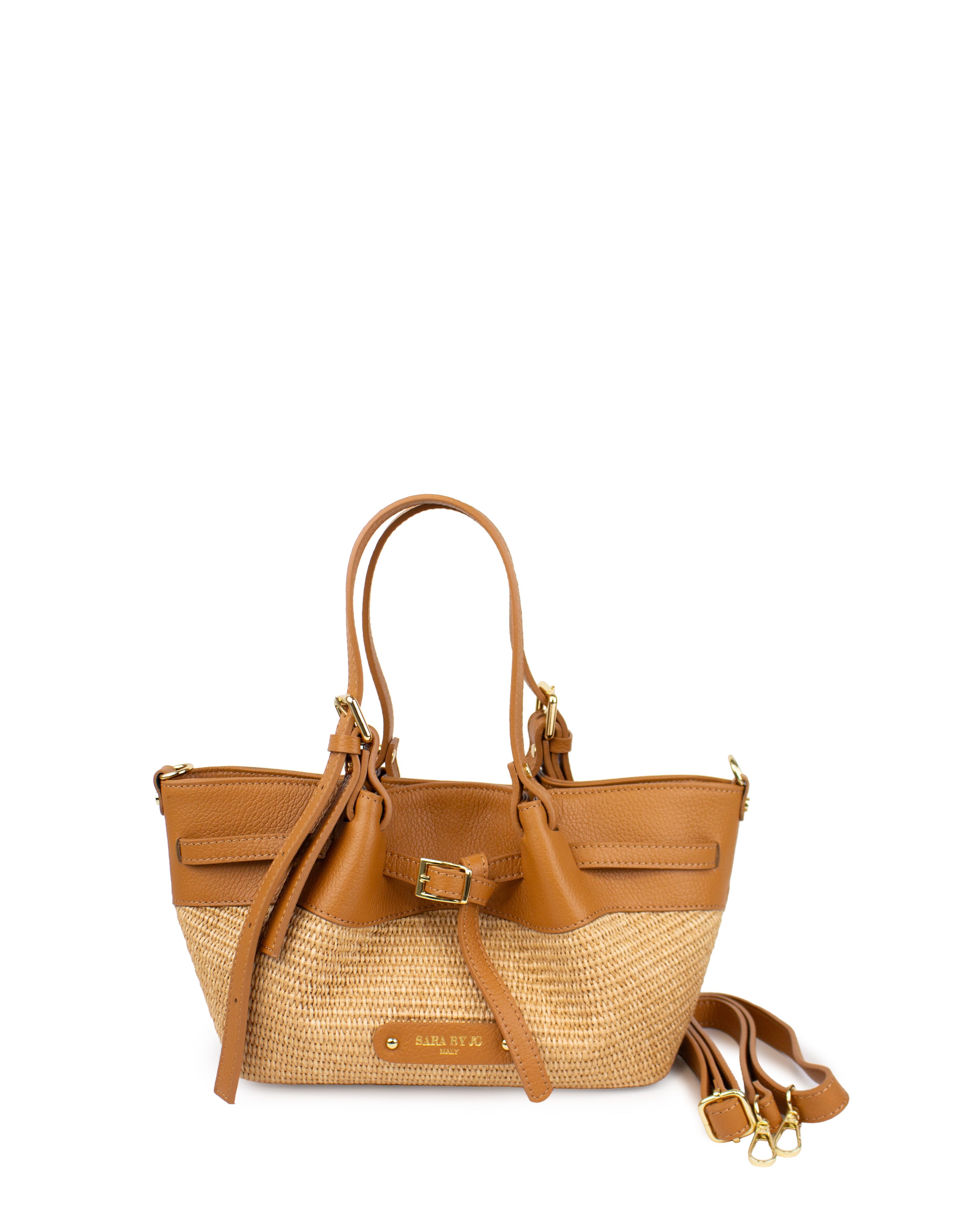 Handcrafted raffia bag featuring natural woven fibers and soft Italian leather in a stylish design.