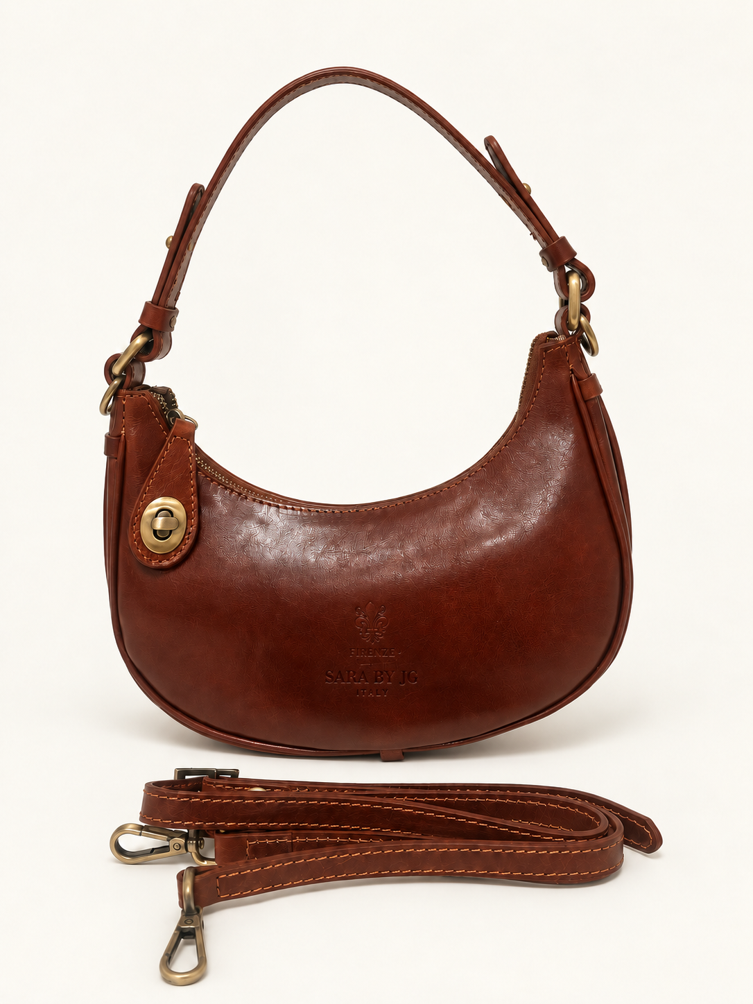 Cognac-brown crescent shoulder bag — SARA BY JG colourless heat-deboss branding preview