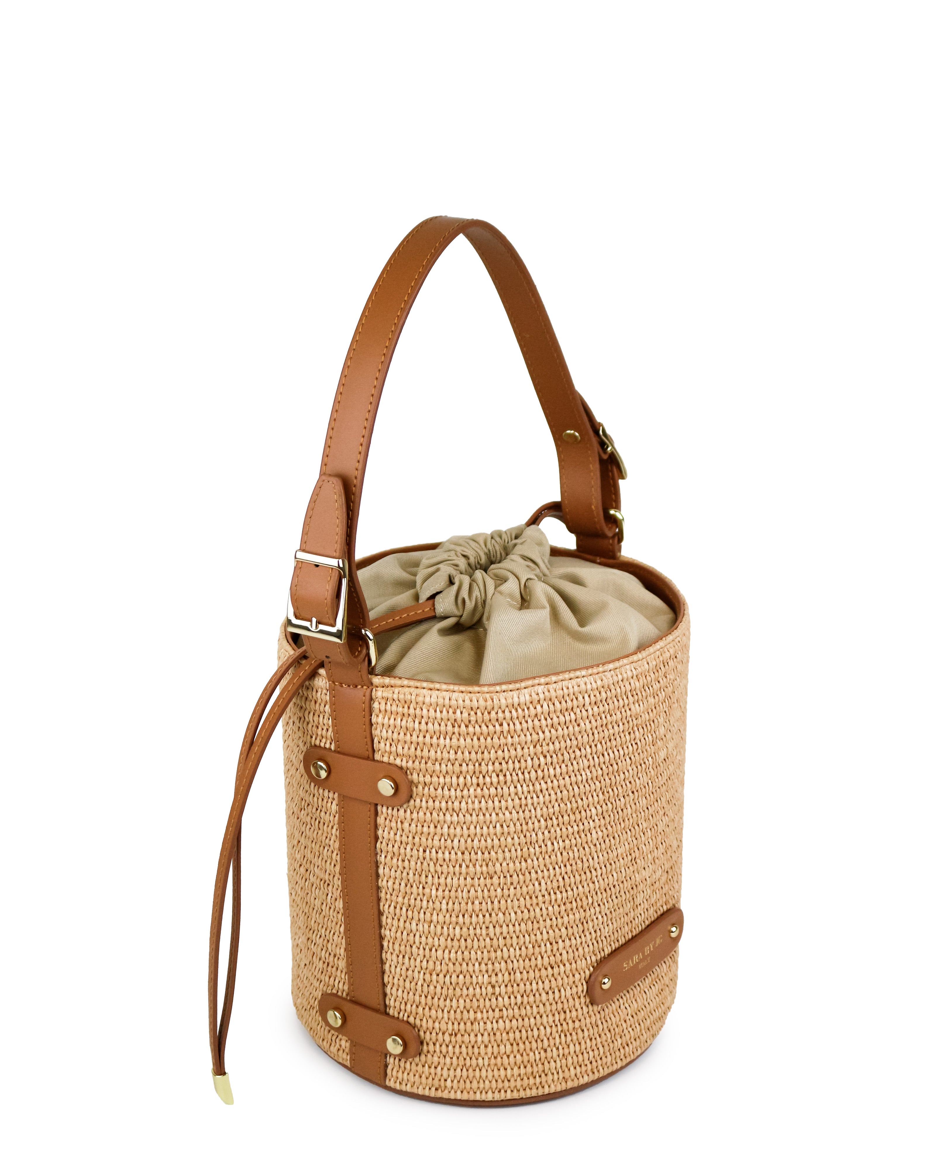 Raffia handbag La Raccolta crafted in Florence with a cylindrical shape and natural texture.